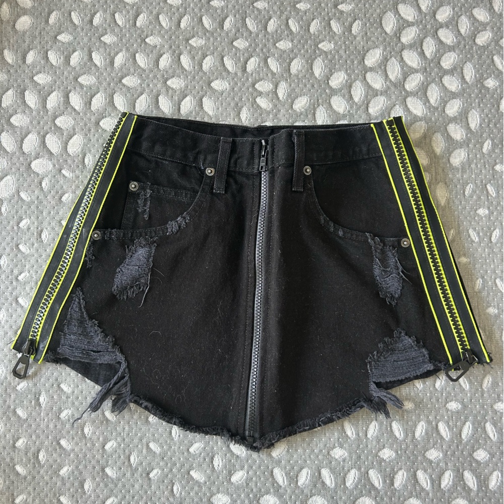 Carmar denim black skirt with neon green side zippers. Size 25